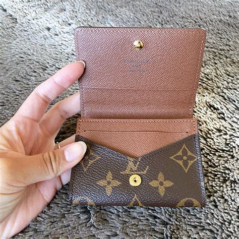 fake red louis vuitton card holder|counterfeit louis vuitton wallet.